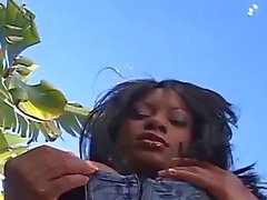 Nasty ebony in fishnets serving two monster black cocks in the hood