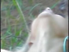 Guy fucks blonde outdoors