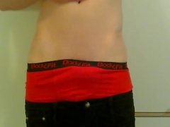 sagging black slim jeans in red boxerbriefs