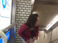 Asian ho pees in metro station