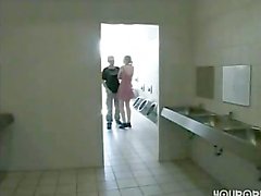 Guy fucks a girl in a public toilet