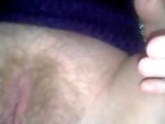 Wife plays with her hairy pussy with red dildo