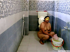 Chubby Indian Bhabhi taking bathroom after rough sex