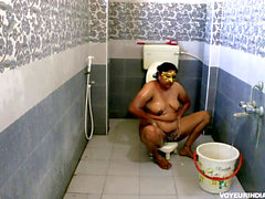 Chubby Indian Bhabhi taking bathroom after rough sex