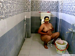 Chubby Indian Bhabhi taking bathroom after rough sex